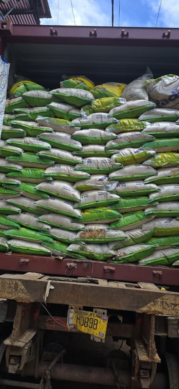 Stacked bagged rice cargo loaded onto a truck