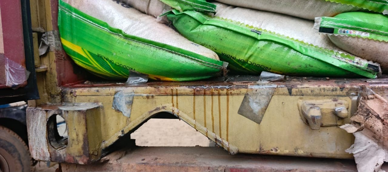 Close-up of torn bag damage inside a container