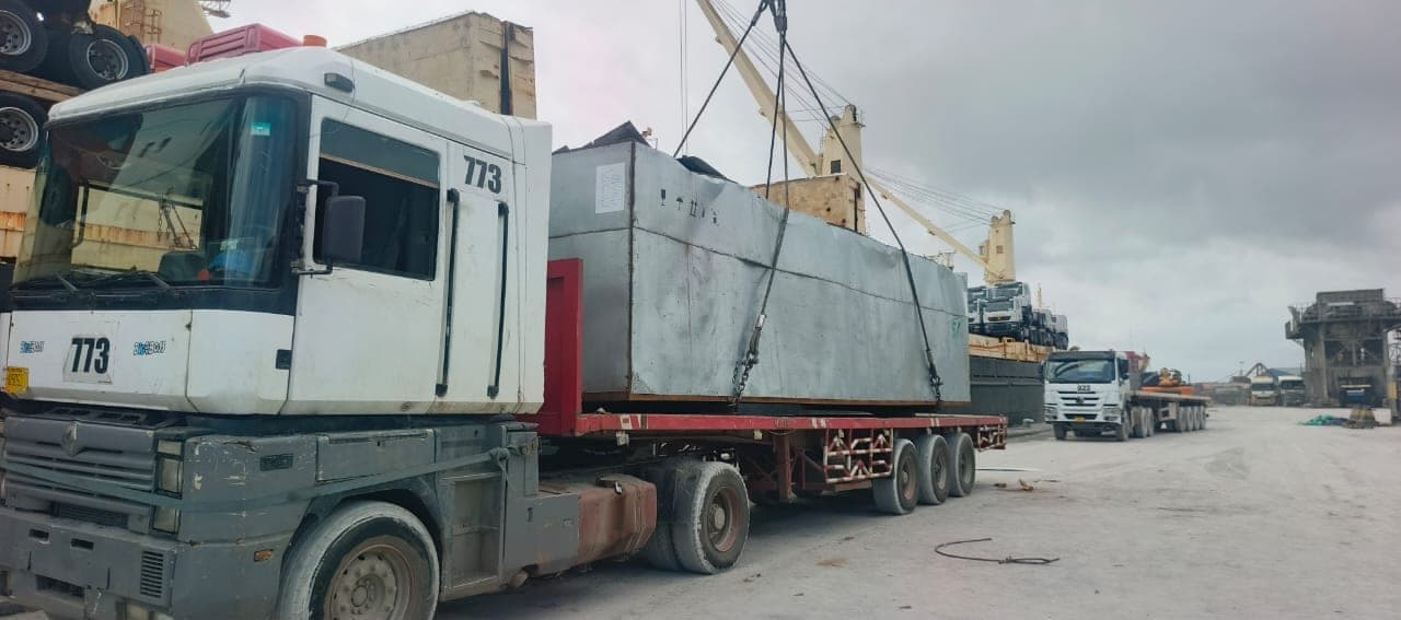 Heavy-lift cargo being transported on a trailer at port